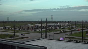 Weather camera view of Iowa Colony Police Department.